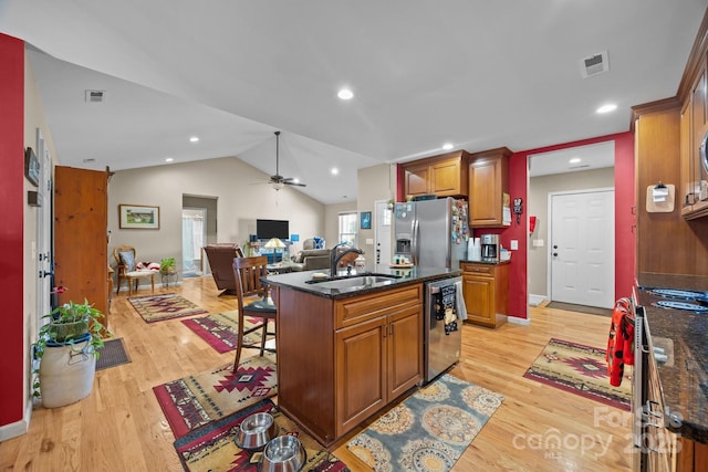 2369 Saratoga Run, Morganton, NC 28655 - kitchen with appliances with stainless steel finishes, open floor plan, a ceiling fan, light wood-style flooring, and lofted ceiling