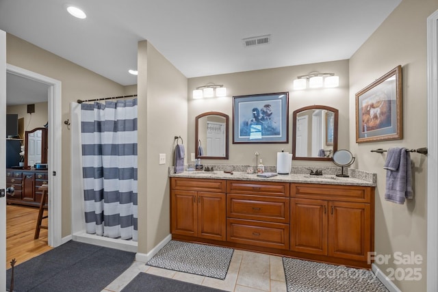 2369 Saratoga Run, Morganton, NC 28655 - bathroom with double vanity, curtained shower, tile patterned floors, and recessed lighting