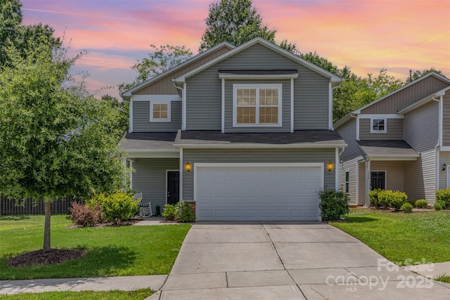 1514 Starmount Cove Ln, Charlotte, NC 28210 - view of front facade with an attached garage, a lawn, and concrete driveway