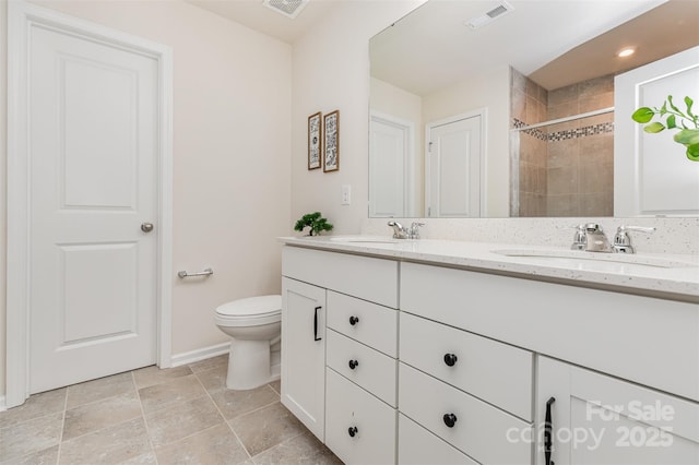 1514 Starmount Cove Ln, Charlotte, NC 28210 - full bath with double vanity, tiled shower, and recessed lighting