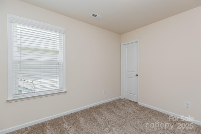1514 Starmount Cove Ln, Charlotte, NC 28210 - carpeted spare room featuring plenty of natural light