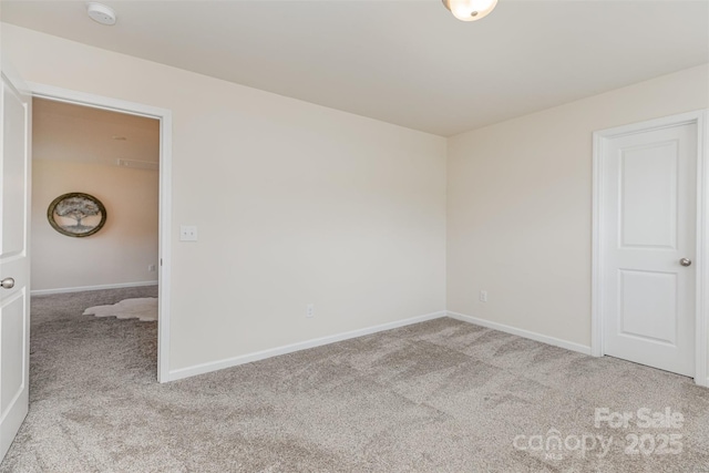 1514 Starmount Cove Ln, Charlotte, NC 28210 - carpeted empty room featuring a smoke detector and baseboards