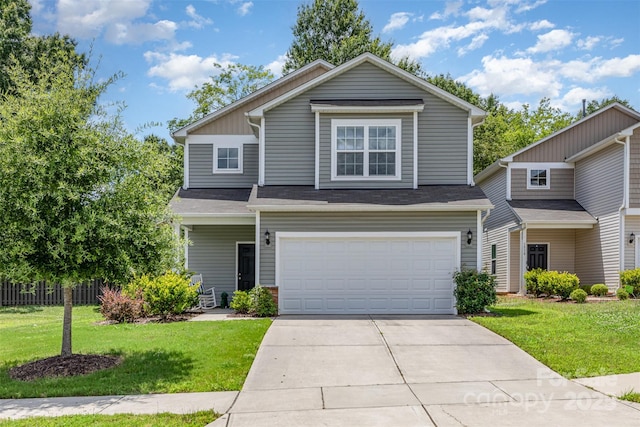 1514 Starmount Cove Ln, Charlotte, NC 28210 - view of front of home featuring an attached garage, a front yard, and concrete driveway