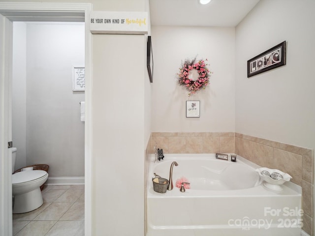 9428 Carneros Creek Rd, Charlotte, NC 28214 - full bathroom featuring a garden tub and tile patterned flooring