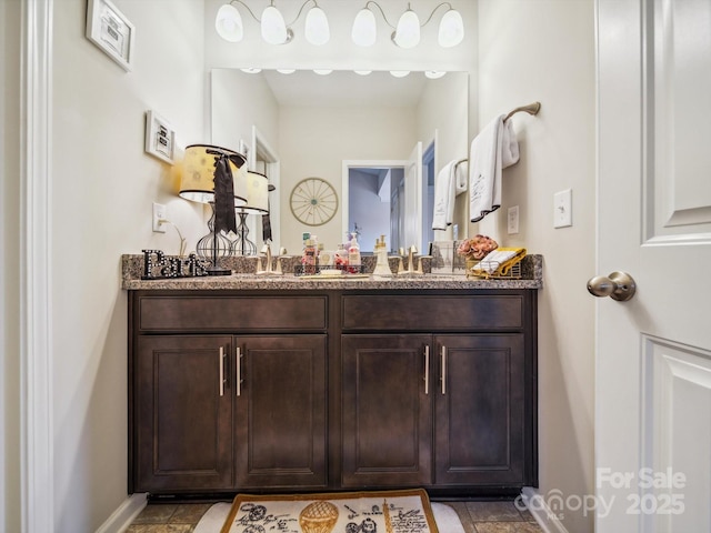 9428 Carneros Creek Rd, Charlotte, NC 28214 - bathroom with vanity and stone finish flooring