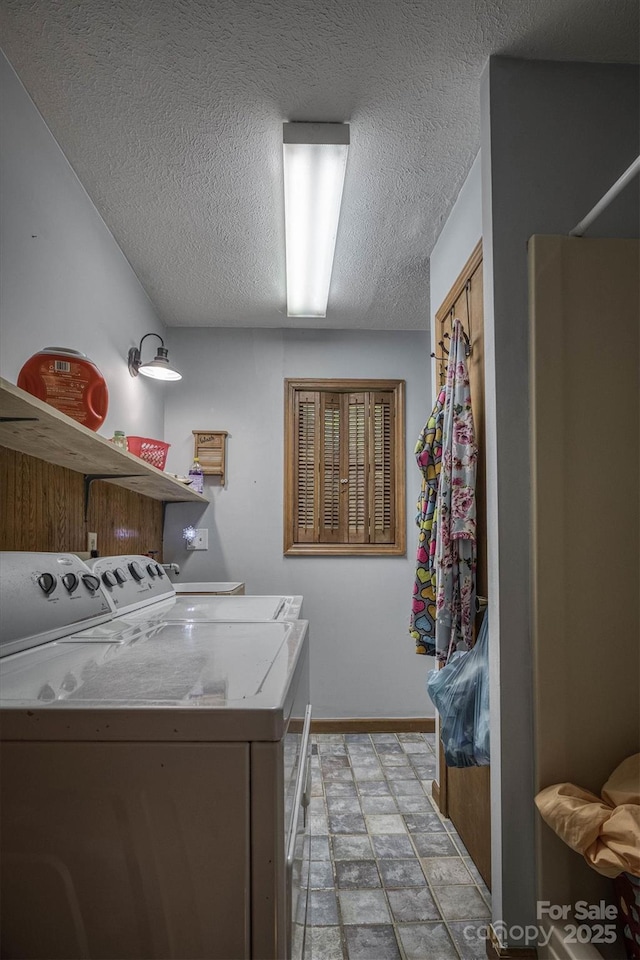 665 Will Robbins Ln, Newland, NC 28657 - laundry area with independent washer and dryer and a textured ceiling