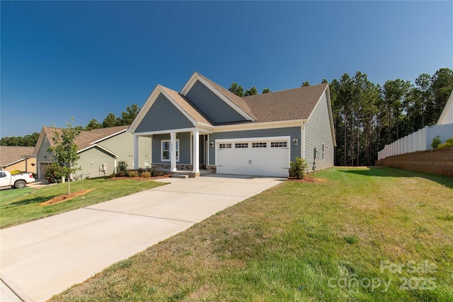 5244 Admirals Lndg, Lancaster, SC 29720 - view of front facade featuring an attached garage, driveway, and covered porch