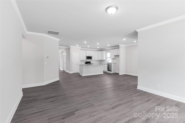 5244 Admirals Lndg, Lancaster, SC 29720 - unfurnished living room with ornamental molding, recessed lighting, and dark wood-type flooring