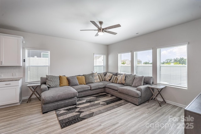 1010 Harry Ct, Albemarle, NC 28001 - living room featuring light wood-style flooring and ceiling fan