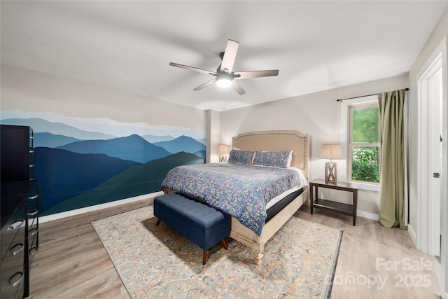 204 Terrys Gap Loop Rd, Fletcher, NC 28732 - bedroom featuring wood finished floors and a ceiling fan