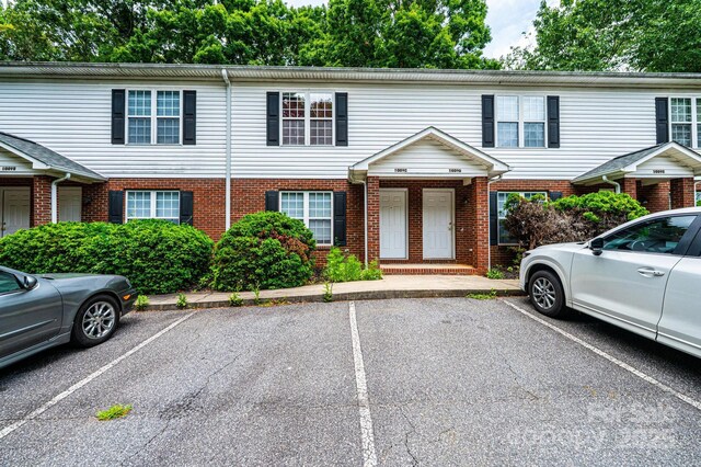 1009 22nd St NE Unit A-E, Hickory, NC 28601 - townhome / multi-family property with uncovered parking and brick siding