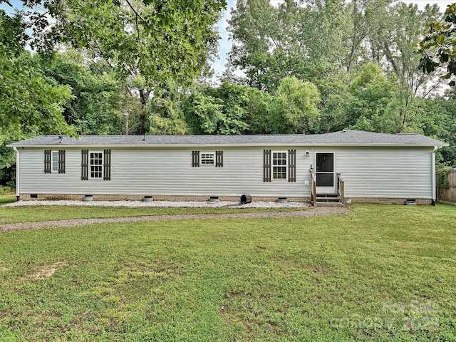 1140 Randall Ct, Concord, NC 28025 - view of front of property with crawl space, entry steps, a front yard, roof with shingles, and view of wooded area