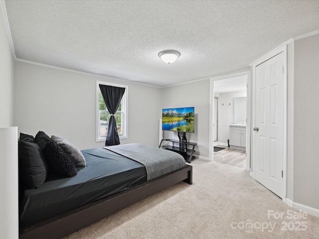 1140 Randall Ct, Concord, NC 28025 - bedroom with ornamental molding, light carpet, a textured ceiling, and ensuite bath