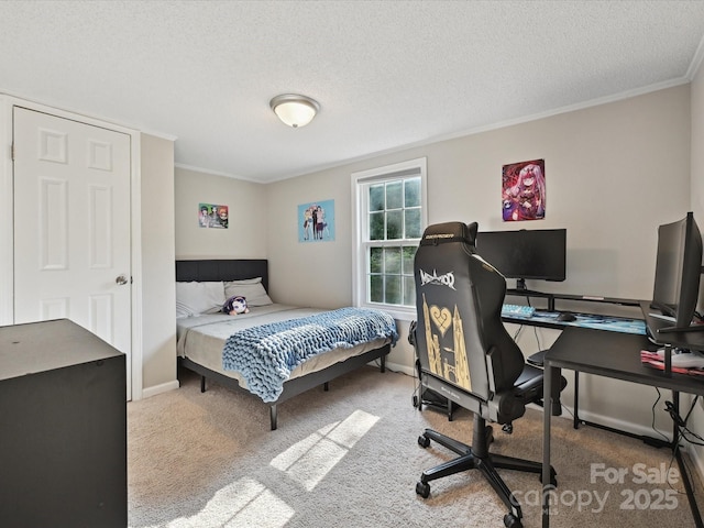 1140 Randall Ct, Concord, NC 28025 - bedroom featuring ornamental molding, a textured ceiling, carpet flooring, and a desk