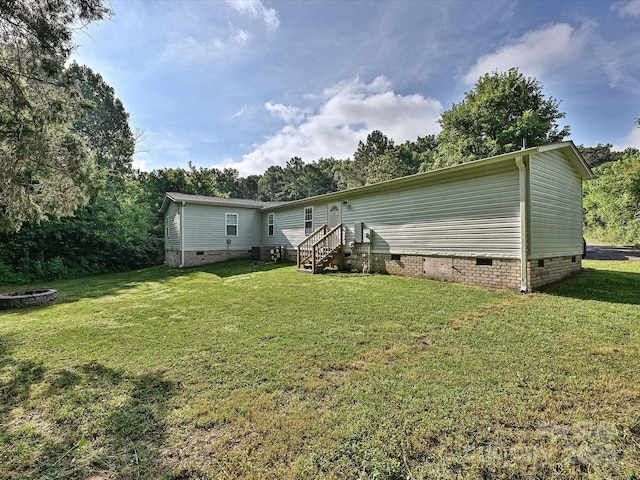 1140 Randall Ct, Concord, NC 28025 - back of property featuring crawl space and a yard