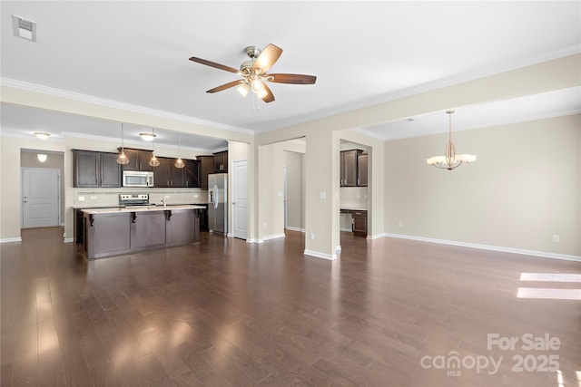 921 Summerlake Dr, Fort Mill, SC 29715 - unfurnished living room featuring ceiling fan, a chandelier, dark wood-style flooring, and crown molding