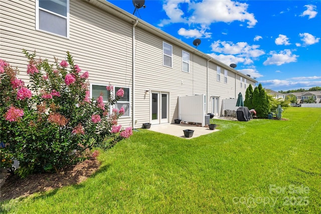 921 Summerlake Dr, Fort Mill, SC 29715 - back of property featuring a lawn and a patio