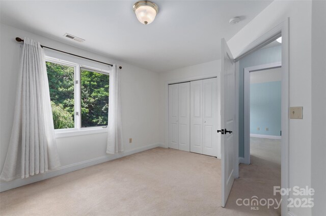 38 Live View Ln, Clyde, NC 28721 - unfurnished bedroom with light colored carpet and a closet
