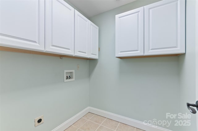 38 Live View Ln, Clyde, NC 28721 - laundry room with cabinet space, hookup for an electric dryer, hookup for a washing machine, and light tile patterned floors