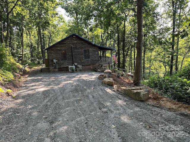 849 Camp Hill Rd, Mill Spring, NC 28756 - view of property exterior with a wooded view