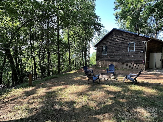 849 Camp Hill Rd, Mill Spring, NC 28756 - view of yard featuring a fire pit