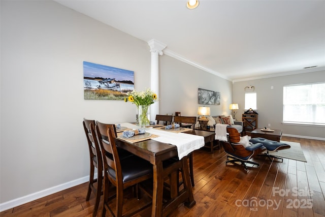 432 W Worthington Ave, Charlotte, NC 28203 - dining area featuring crown molding and dark wood-type flooring