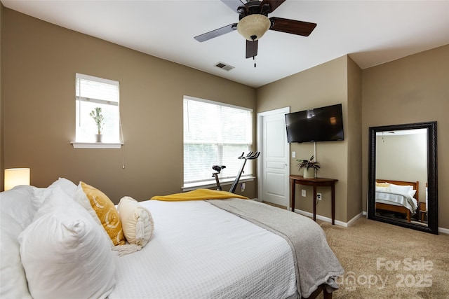 432 W Worthington Ave, Charlotte, NC 28203 - carpeted bedroom featuring baseboards and ceiling fan