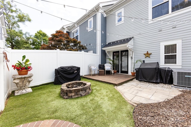 432 W Worthington Ave, Charlotte, NC 28203 - view of yard featuring an outdoor fire pit and a patio