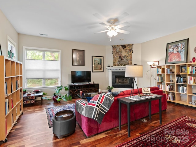 91 Talon Trail Ln, Etowah, NC 28729 - living room featuring ceiling fan, a fireplace, and wood finished floors
