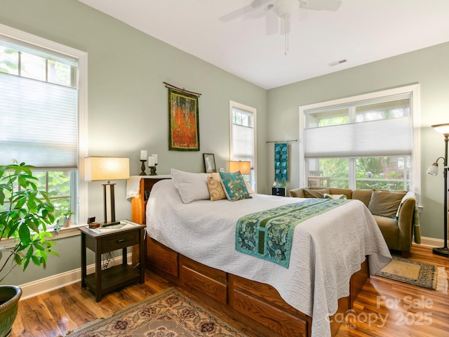 91 Talon Trail Ln, Etowah, NC 28729 - bedroom with wood finished floors and a ceiling fan