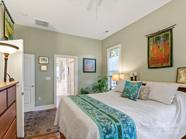 91 Talon Trail Ln, Etowah, NC 28729 - bedroom featuring wood finished floors, ceiling fan, and ensuite bath