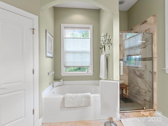91 Talon Trail Ln, Etowah, NC 28729 - bathroom with a bath, a shower stall, and tile patterned flooring