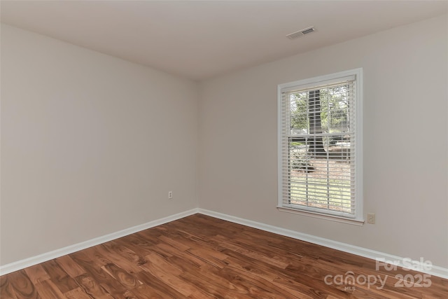 2706 Bremer Ct, Charlotte, NC 28210 - spare room with dark wood finished floors and baseboards