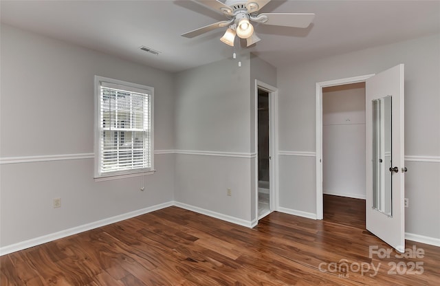 2706 Bremer Ct, Charlotte, NC 28210 - unfurnished bedroom featuring wood finished floors, ceiling fan, and a closet