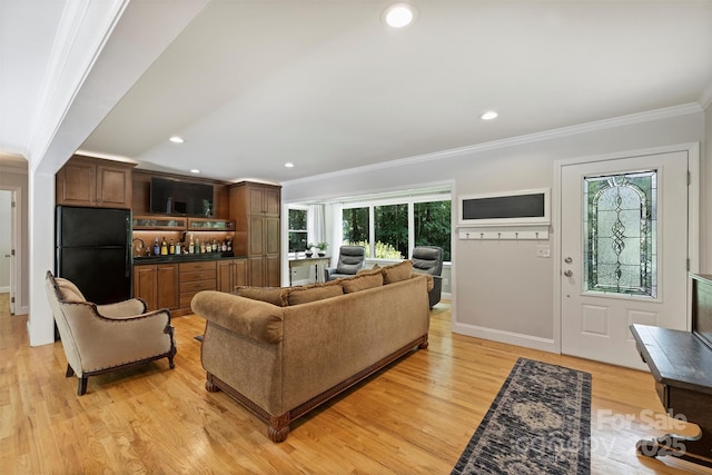 6411 Glenn Teague Rd, Charlotte, NC 28216 - living area with ornamental molding, a bar, light wood-style floors, and recessed lighting