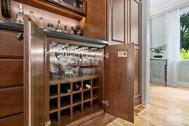 6411 Glenn Teague Rd, Charlotte, NC 28216 - bar area with wood finished floors and baseboards