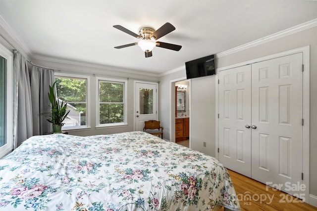 6411 Glenn Teague Rd, Charlotte, NC 28216 - bedroom with ornamental molding, light wood finished floors, a ceiling fan, a closet, and connected bathroom