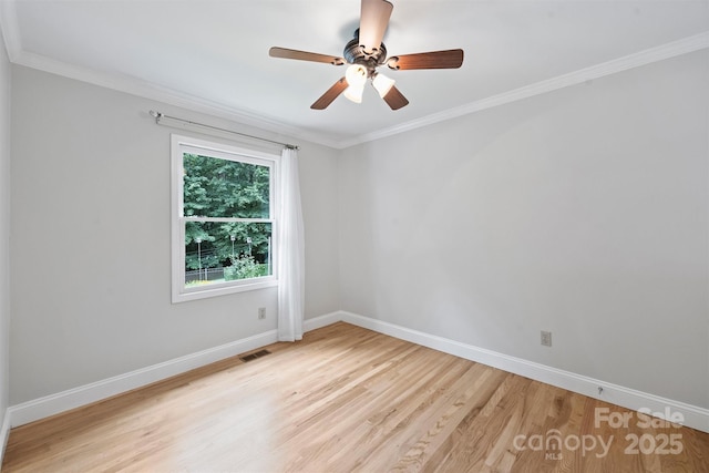 6411 Glenn Teague Rd, Charlotte, NC 28216 - empty room featuring light wood-style flooring, crown molding, and a ceiling fan