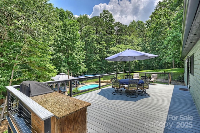 6411 Glenn Teague Rd, Charlotte, NC 28216 - wooden deck featuring outdoor dining space