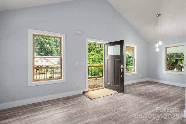 2513 Rolfe St, Hendersonville, NC 28791 - entryway featuring wood finished floors and high vaulted ceiling