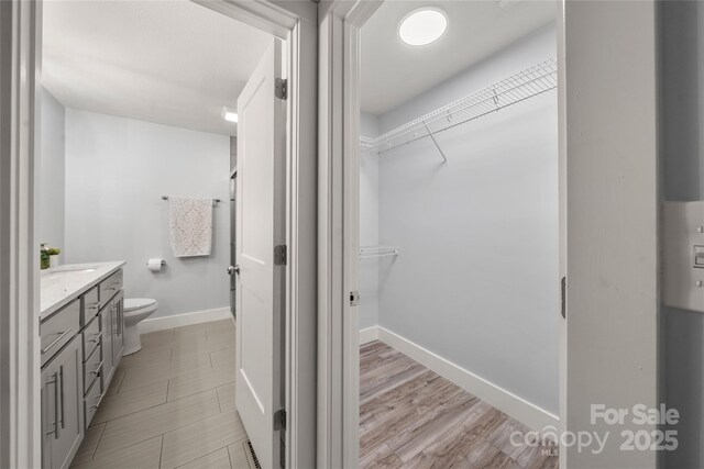 2513 Rolfe St, Hendersonville, NC 28791 - full bath featuring vanity and a walk in closet