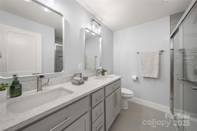 2513 Rolfe St, Hendersonville, NC 28791 - full bath featuring double vanity and a shower with door