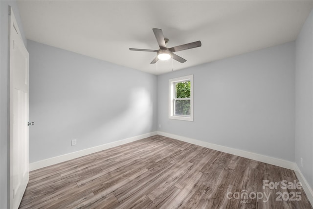 2513 Rolfe St, Hendersonville, NC 28791 - unfurnished room with wood finished floors and a ceiling fan