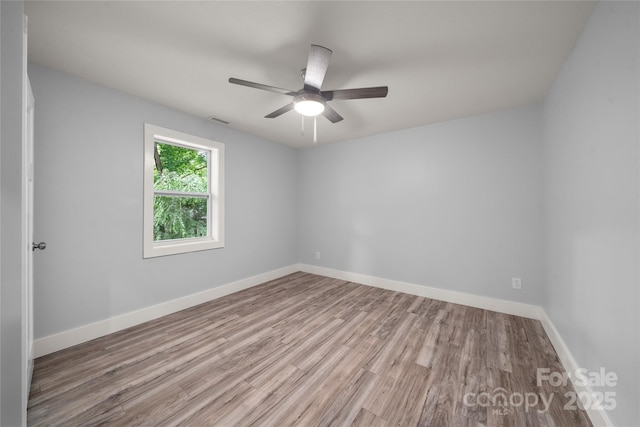 2513 Rolfe St, Hendersonville, NC 28791 - empty room featuring wood finished floors and ceiling fan