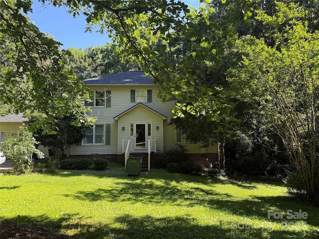 204 S Deerfield Cir, Salisbury, NC 28147 - view of front facade featuring a front yard and an attached garage