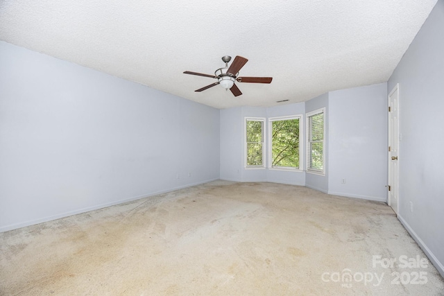 204 S Deerfield Cir, Salisbury, NC 28147 - unfurnished room featuring ceiling fan, carpet floors, and a textured ceiling
