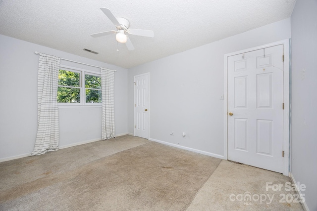 204 S Deerfield Cir, Salisbury, NC 28147 - empty room with carpet floors, ceiling fan, and a textured ceiling