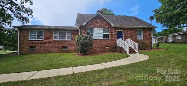 2828 Bellhaven Cir, Charlotte, NC 28214 - view of front of property featuring a front yard, brick siding, a chimney, and roof with shingles