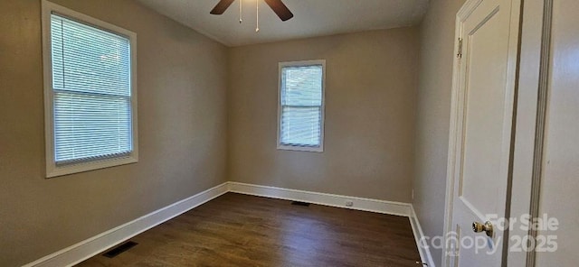 2828 Bellhaven Cir, Charlotte, NC 28214 - unfurnished room featuring a ceiling fan and dark wood-style floors