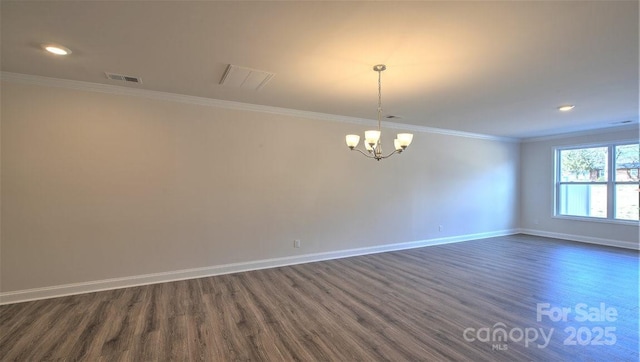 122 Sugg Trl, Weaverville, NC 28787 - spare room with crown molding, dark wood finished floors, a chandelier, and recessed lighting